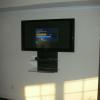 50" Plasma with optional flat screen shelving kit. This is an inexpensive was to keep the cable box and DVD payer neat near the TV